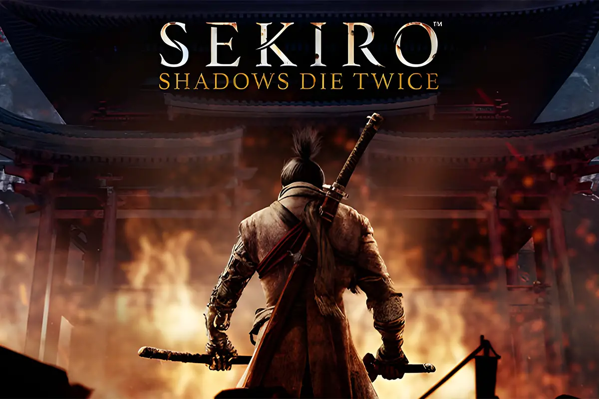 Man standing with weapons outside a burning building in Sekiro: Shadows Dies Twice.