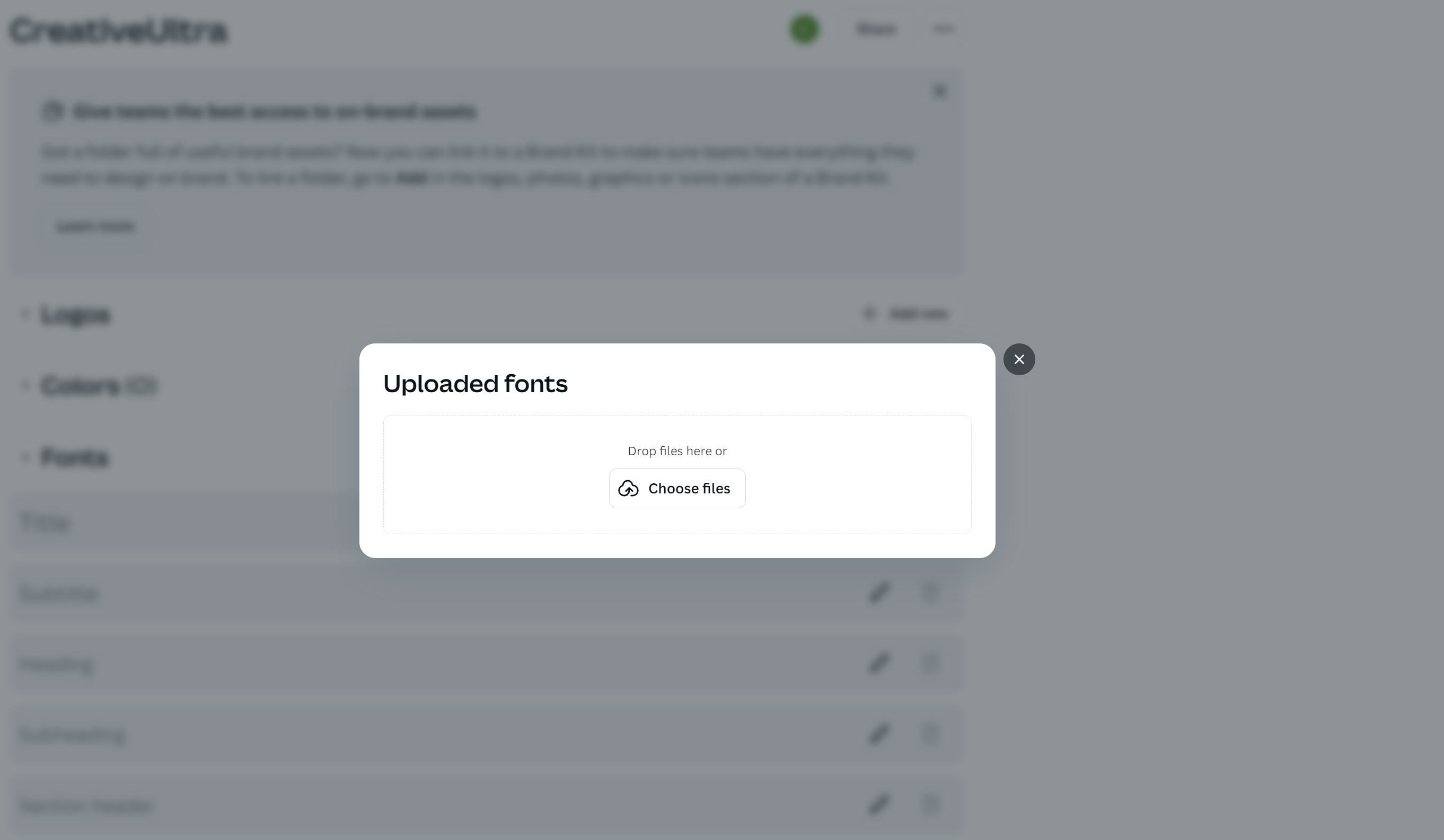 Popup window displaying "Uploaded fonts" with options to drop files or choose files.