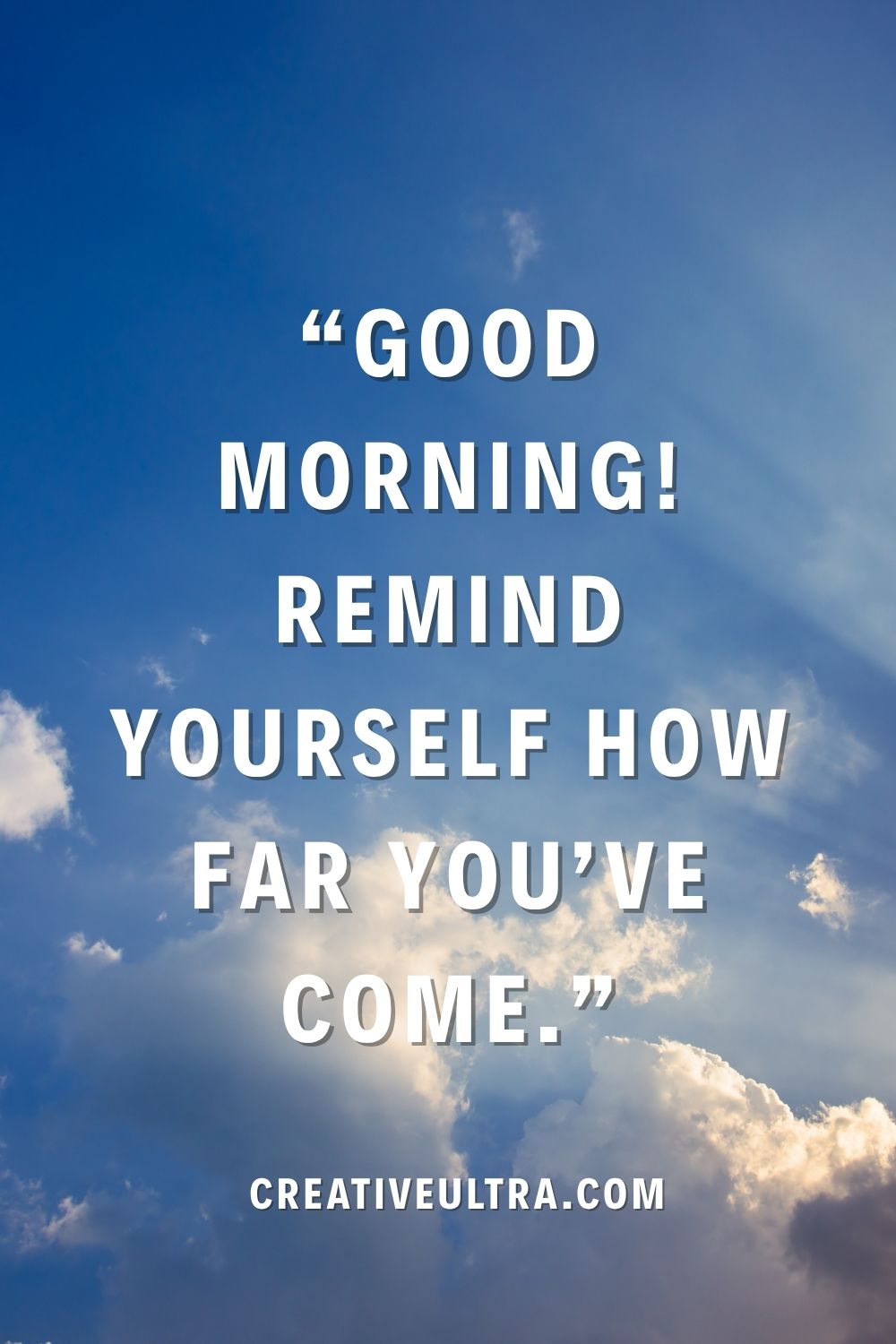 Inspirational text overlaying a bright blue sky with fluffy clouds reads, "Good morning! Remind yourself how far you’ve come." The tone is uplifting and motivational.