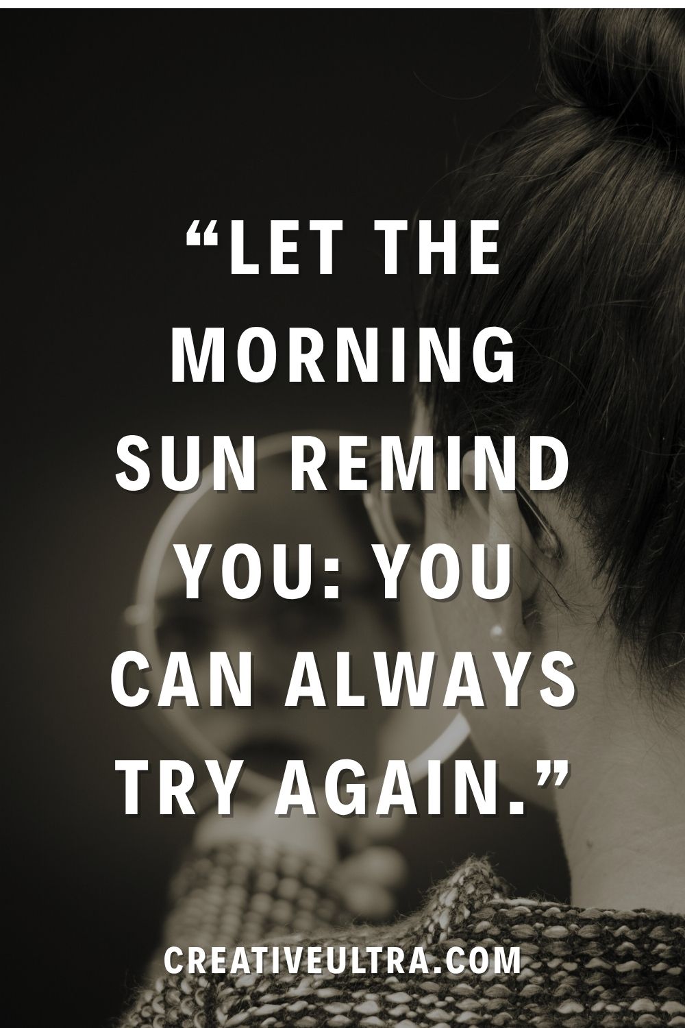 A person with dark hair is facing away, holding a mirror. Overlaid text reads, "Let the morning sun remind you: You can always try again." Emphasizes hope and renewal.